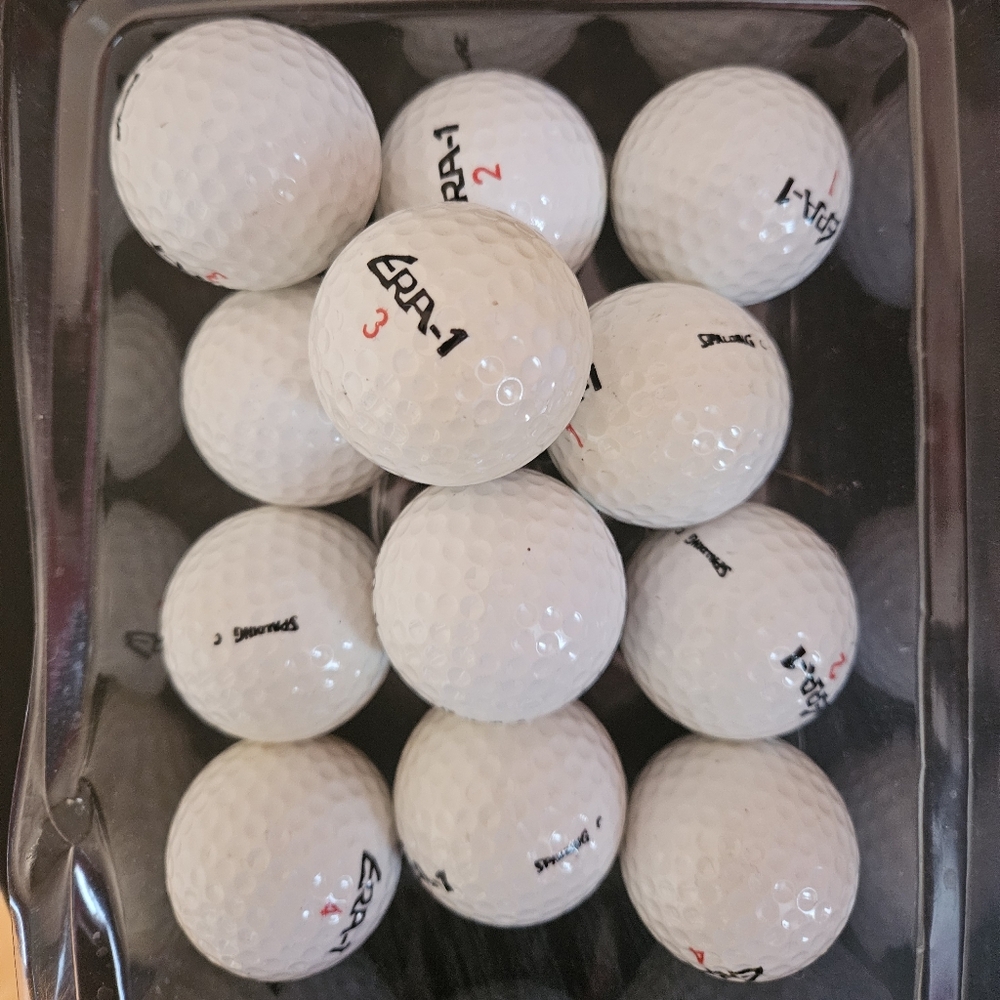 12 ERA Spalding golf balls